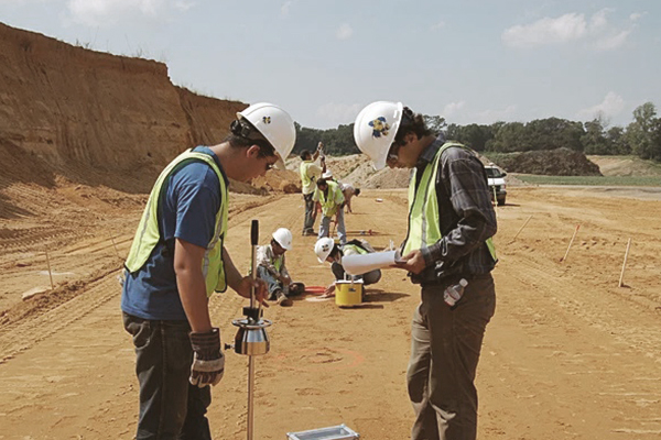 Geotechnical Engineers Taking Site Measurements 3